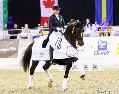 Dorothee Schneider and Quantum Vis win the national Louisdor cup qualifier for developing Grand Prix horses