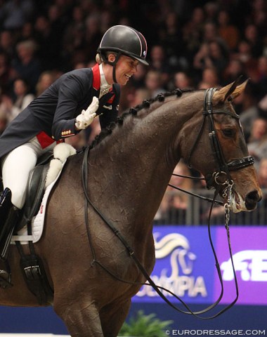 Charlotte Dujardin pats Mount St. John Freestyle