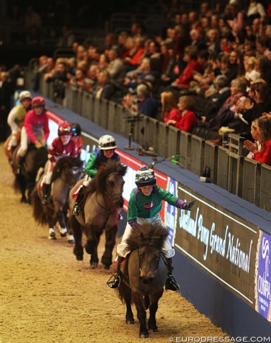 The Shetland jockeys wave to the crowds