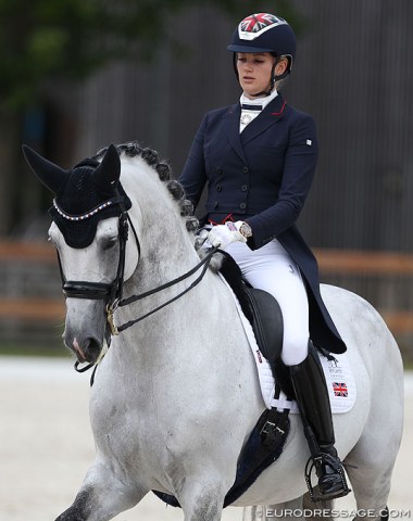 British Ellen McCarthy and Sir Lancelot M (by Lordanos x Ginsberg). Beautiful light contact and an easy way of going, but a break into canter in passage and issues in the one tempi changes kept them from scoring higher on their return to the arena after an injury.