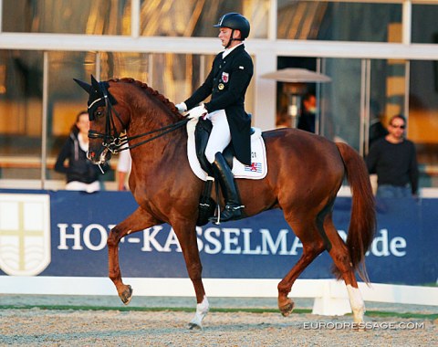 Nicolas Wagner and Quater Back Junior riding in magic hour light.