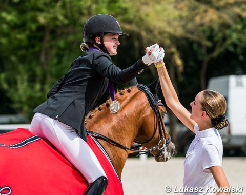 Sophia Obel Jorgensen and Liva Addy Guldager Nielsen high five