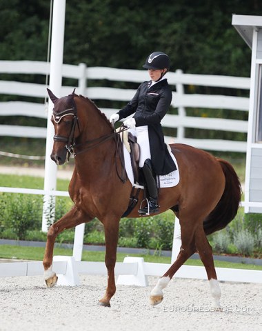 Belarus Katsiaryna Bialevich on Zamora. This horse was trained to GP by Dutch Lynne Maas and then sold to Japan as a Tokyo hopeful for Satoshi Maeda. Now riding for Belarus