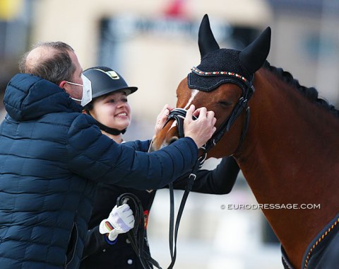 Winners' cuddles for Dark Delight B