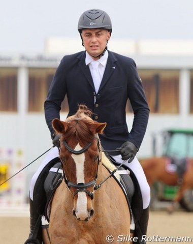 Dominik Ast from Poland warming up his 17-year-old Hanoverian mare Femme de Matcho (Fürst Heinrich-Matcho AA) for his start in Grade IV.