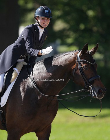 Anna Derlien patting Holly Golightly. Derlien is the daughter of Antje Fricke, who won team gold at the 1989 European Young Riders Championships herself