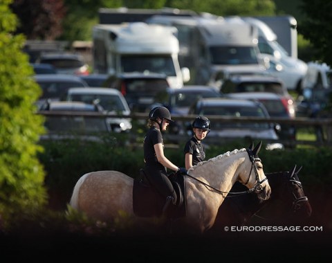 Norwegian pony rider Emma Løkken on JDJ's Flash having a chat while walking her pony with a team mate