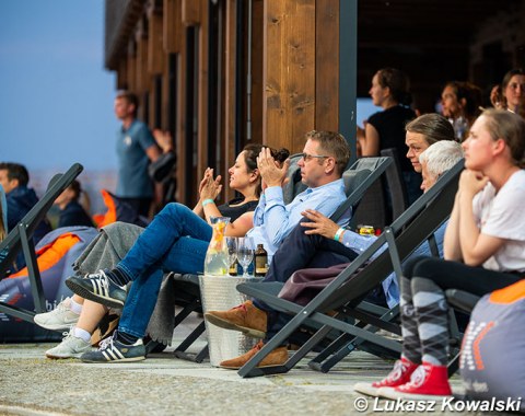 Filip Kowalski's father watching the rides in the crowds