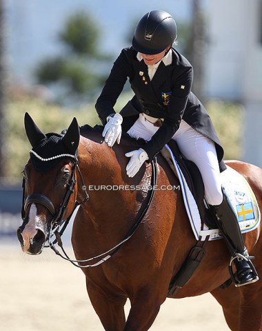 Sweden's Matilda Illerfelt gives Bento D a double pat