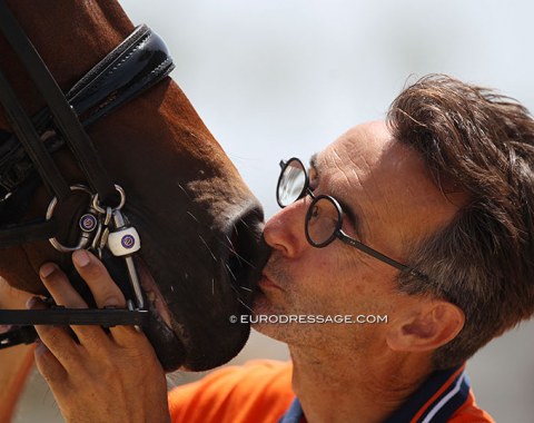 Evi van Rooij's father Arthur kisses Don Tango B