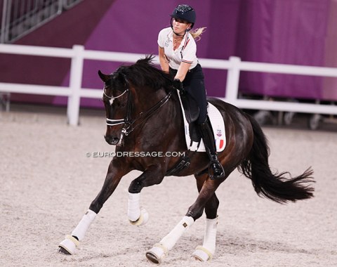 France's Morgan Barbançon Mestre finishes her ride on Sir Donnerhall II in a canter in two point with lots of pats