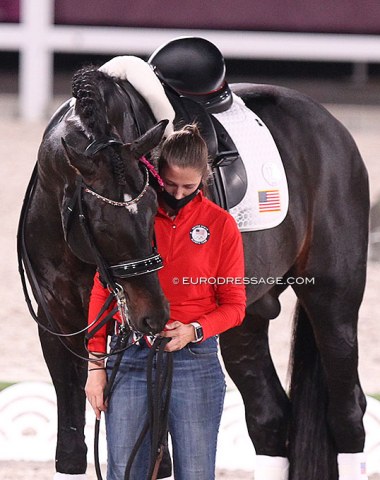 Groom Morgan Klingensmith cuddling with Salvino