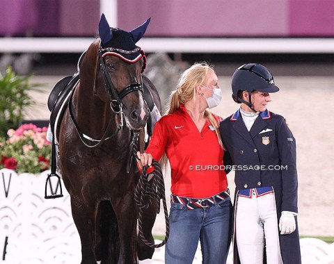 Sabine Schut-Kery hugging her groom