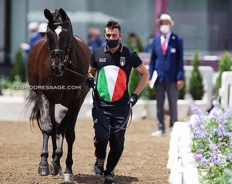 Italy's Francesco Zaza with Whispering Romance. You can't miss the Italian flag on that outfit, designed by Emporio Armani
