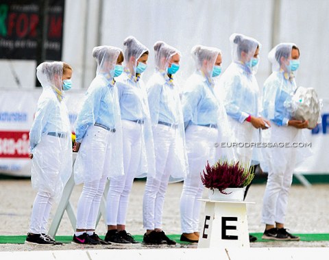 The flower girls as if wearing space suits to brave the rain in Verden