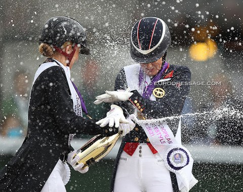 Jessica and Charlotte in a champagne shower battle