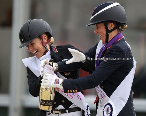 The champagne shower became quite a tussle but it all ended amicably 