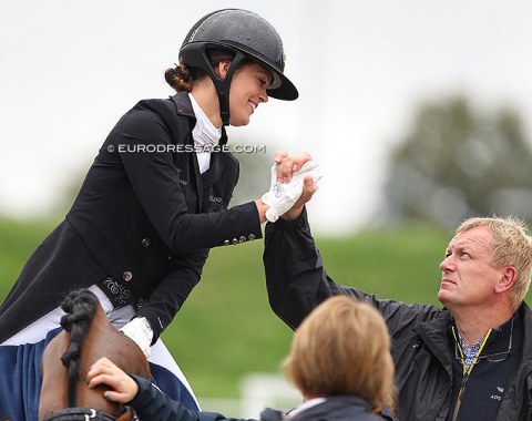 Anne-Mette Strandby high fives with Esben Möller who left Blue Hors for Helgstrand