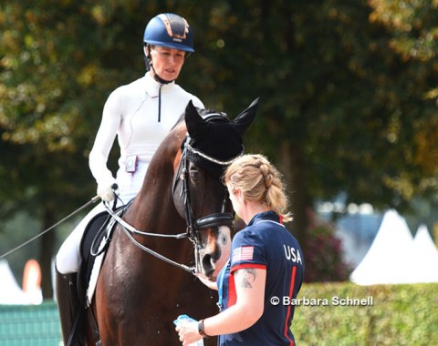 Charlotte Jorst's groom pats Nintendo