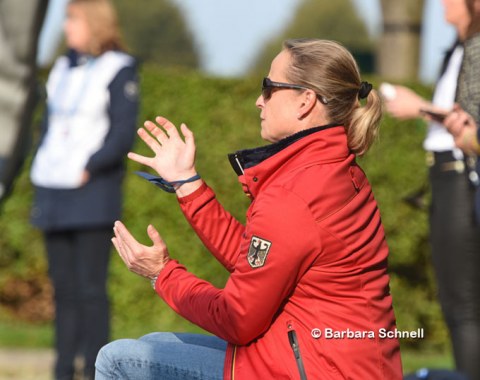 Isabell Werth coaching her students in Aachen