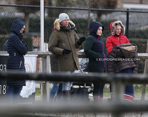 Cold trainers, grooms and team members in Opglabbeek