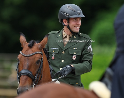 Portuguese based Brazilian Joao Victor Marcari Oliva in military outfit. Aside from being his country's highest scoring Grand Prix riders, the 26-year old is also the heartthrob of dressage sport
