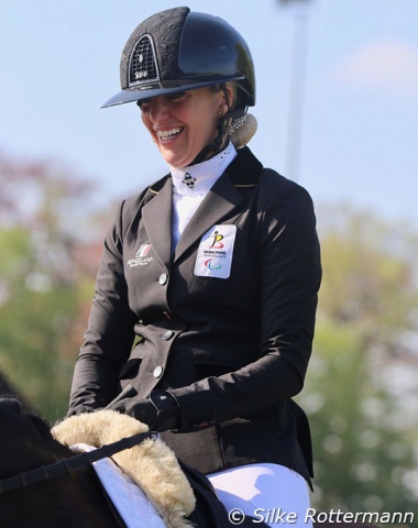 Tokyo grade IV medalist Manon Claeys from Belgium all smiles after her second place in grade IV with Katharina Sollenburg whom she has owned since the KWPN mare was 18 months old.