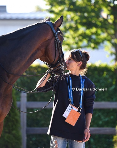 Simone Pearce's groom Emily Reudavey kissing Royal and Proud