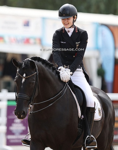 Allegra pats Libertad at the end of her team test