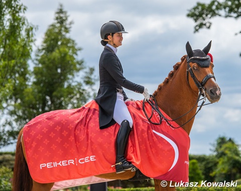 American young rider Miki Yang won the Kur to Music on Donavan after not riding (DNS) in the team test and placing fourth in the individual test