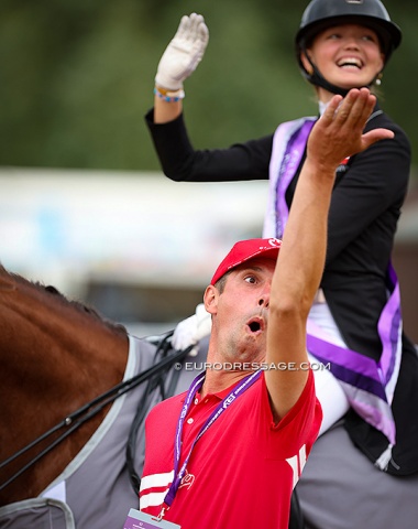 Danish team trainer Dennis Fisker cheering along with the Danish camp