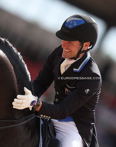 John Thompson pats Chemistry. His girlfriend painted the New Zealand flag herself on his helmet