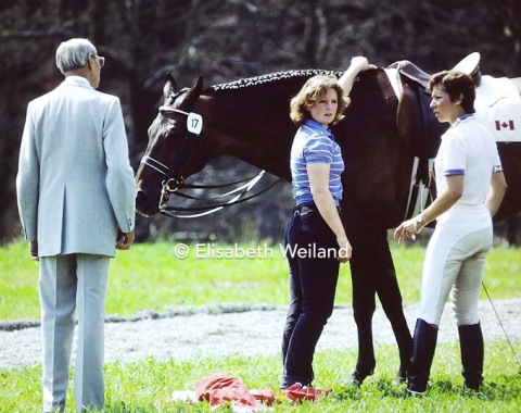 Canadian Christilot Boylen listening to 1966 World champion Josef Neckermann. She came 16th with the Swedish bred gelding Cassius.