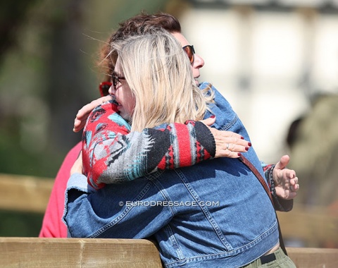 German team trainer Monica Theodorescu hugging Bluetooth's "former" owner, Russian Knyaginicheva. The FEI database says that the horse is owned by Hof Kasselmann as of 7 March 2022, a switch five days after the FEI banned Russian owned horses from competition due to the War in Ukraine