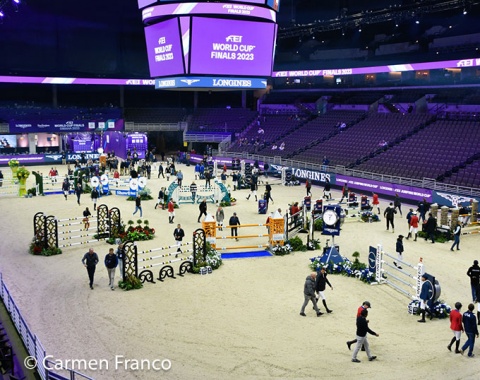 Jumpers walking the course