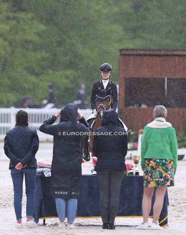 The officials get soaked during the pony team test prize giving ceremony