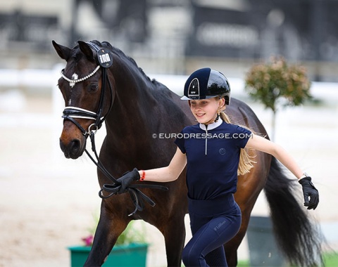 Alexine Herweyers is all smiles as she trots up pony Terbofens Charico