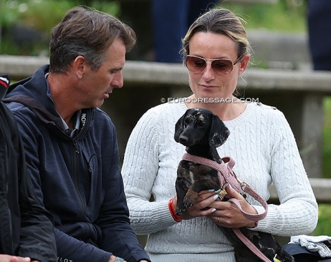 Arnaud and Anne Sophie Serre with a dachshund pup