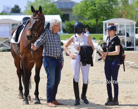 Para dressage, like all equestrian sports, is a real team effort German 5 rider Martina Halter, her Hanoverian gelding Iyvanno K and her support team after their ride