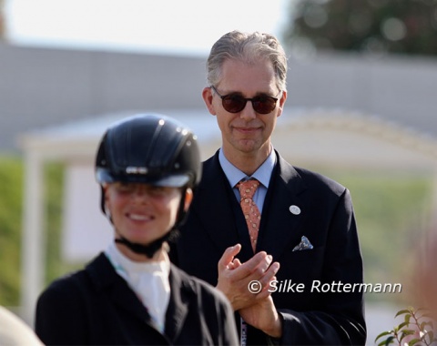 German judge Dr. Jan-Holger Holtschmit applauding the riders he had judged before