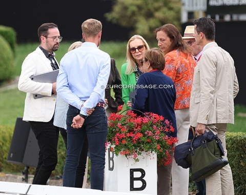 Score calculator Daniel Gohlen, with judges Hans Voser, Alice Schwab, Katrina Wüst, Marietta Almasy, JSP member, David Hunt, TD Mariette Withages, and show organizer Matthias Rath. They met right before the award ceremony to decide on the medals