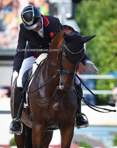 Carl Hester pats Fame