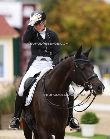 Svenja Kämper-Meyer leaves the arena on Amanyara M (by Ampere x Davignon), not happy with her 69.044% score