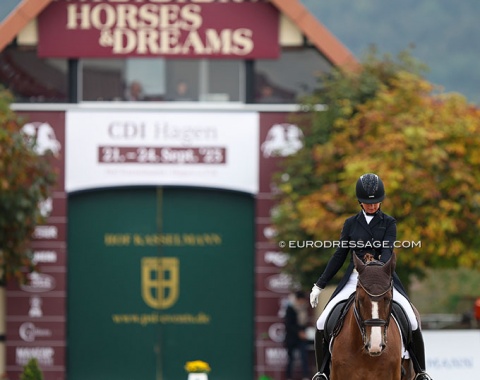 Alina Röhricht salutes for her test at the beautiful Hof Kasselmann. She rode Dolcetto di Maggio (by Dimaggio x Santander H), the full brother to 2018 British WEG team horse Dono di Maggio (under Emile Faurie)