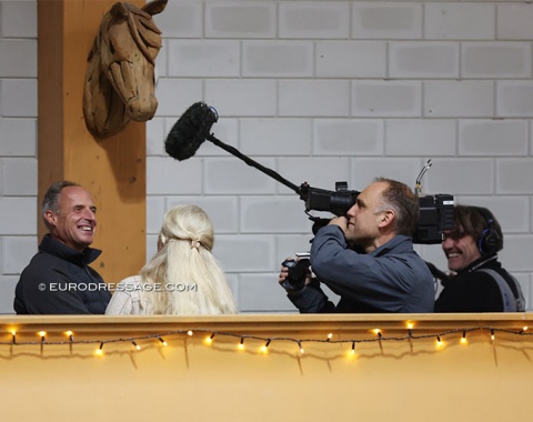 Dutch co-team trainer Patrick van der Meer gets interviewed by the local tv station