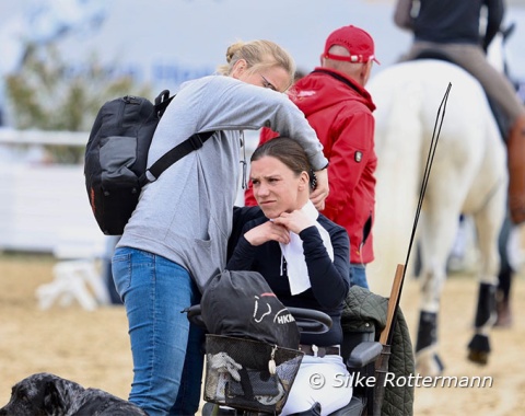 Mara Meyer gets ready at the warm-up ring for her first start