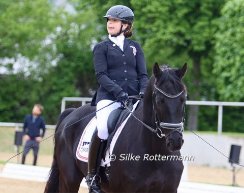 Austrian Julia Sciancalepore starting her Grand Prix A test with the Hanoverian Heinrich IV.