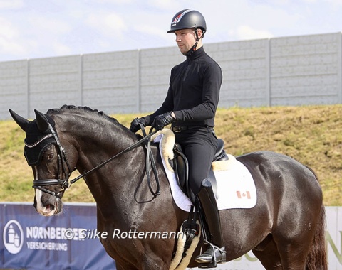 Canadian Grand Prix team rider Ryan Torkkeli schooling Dr. House Jr. before Roberta Sheffield gets on