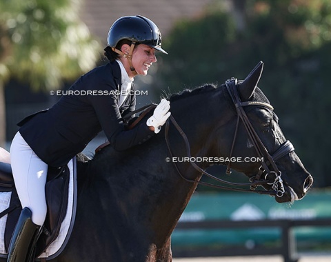 Caroline Darcourt pats Lovsta Stuteri's Serious (by Secret x Furst Romancier)