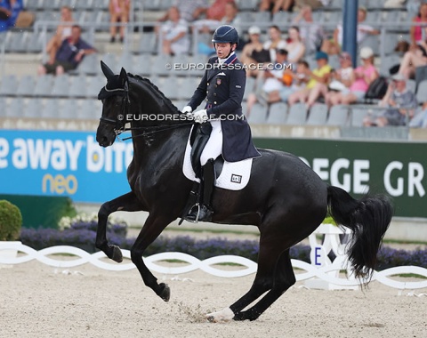 Kevin Kohmann on his own and Terri Kane's Scala (by St; Schufro x Belissimo). The horse did not spook from lightning that struck nearby, but startled when the audience clapped at the end of her test.